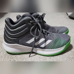 Boys Adidas basketball shoes.